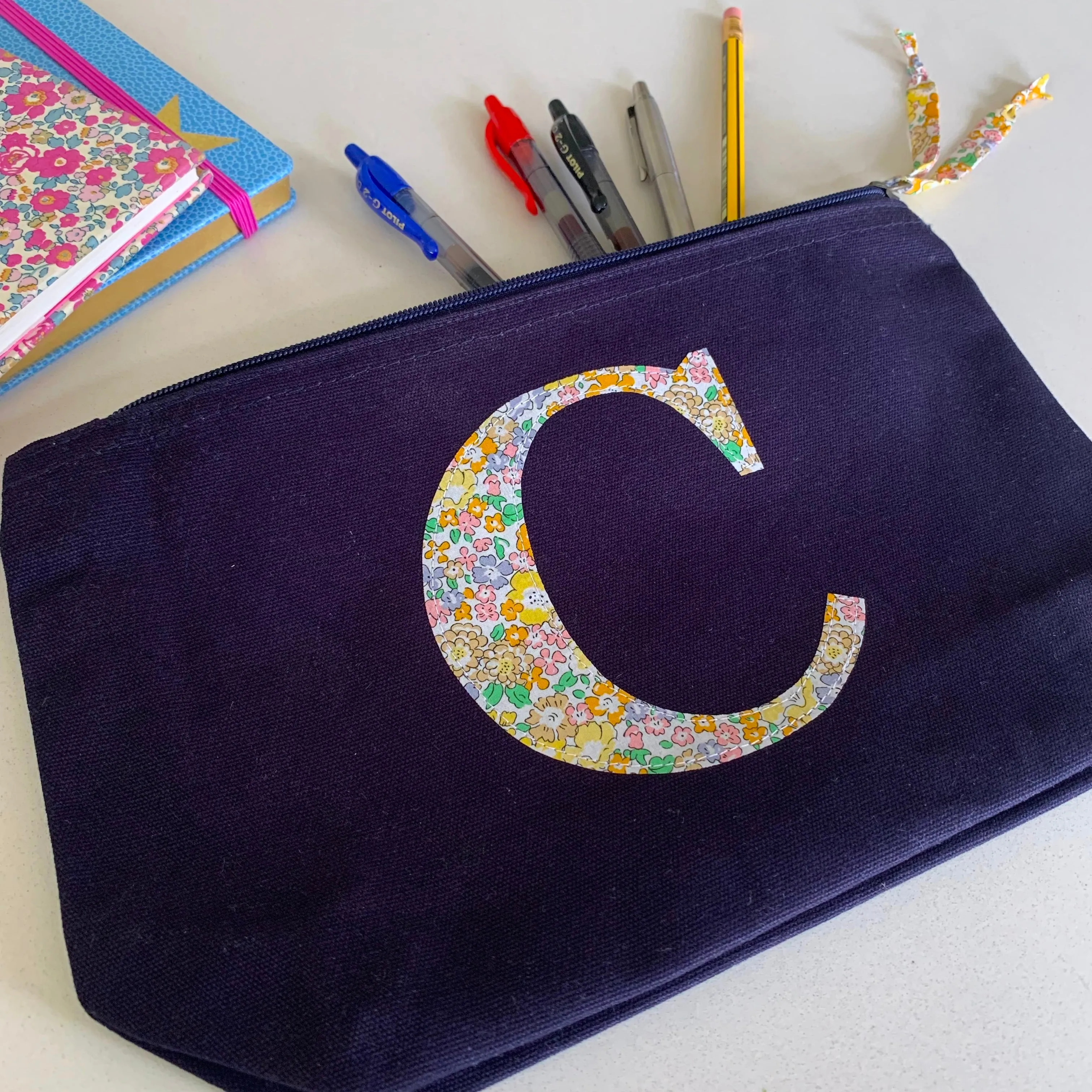 Navy initial pouch