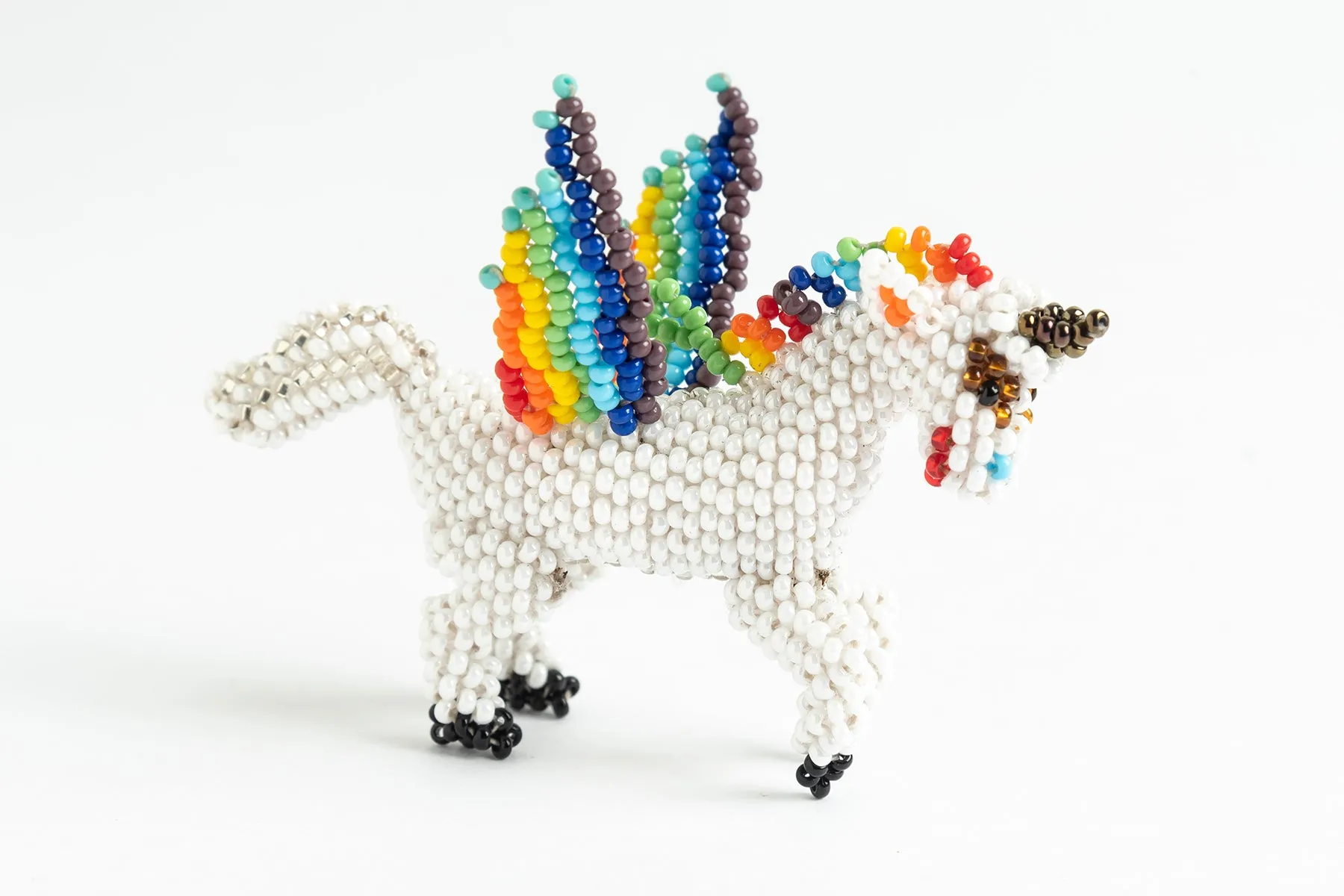 Unicorn with wings; white with rainbow mane, wings